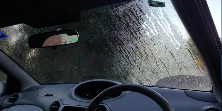 Hình ảnh nút bấm sấy kính trước và sấy kính sau trên bảng điều khiển