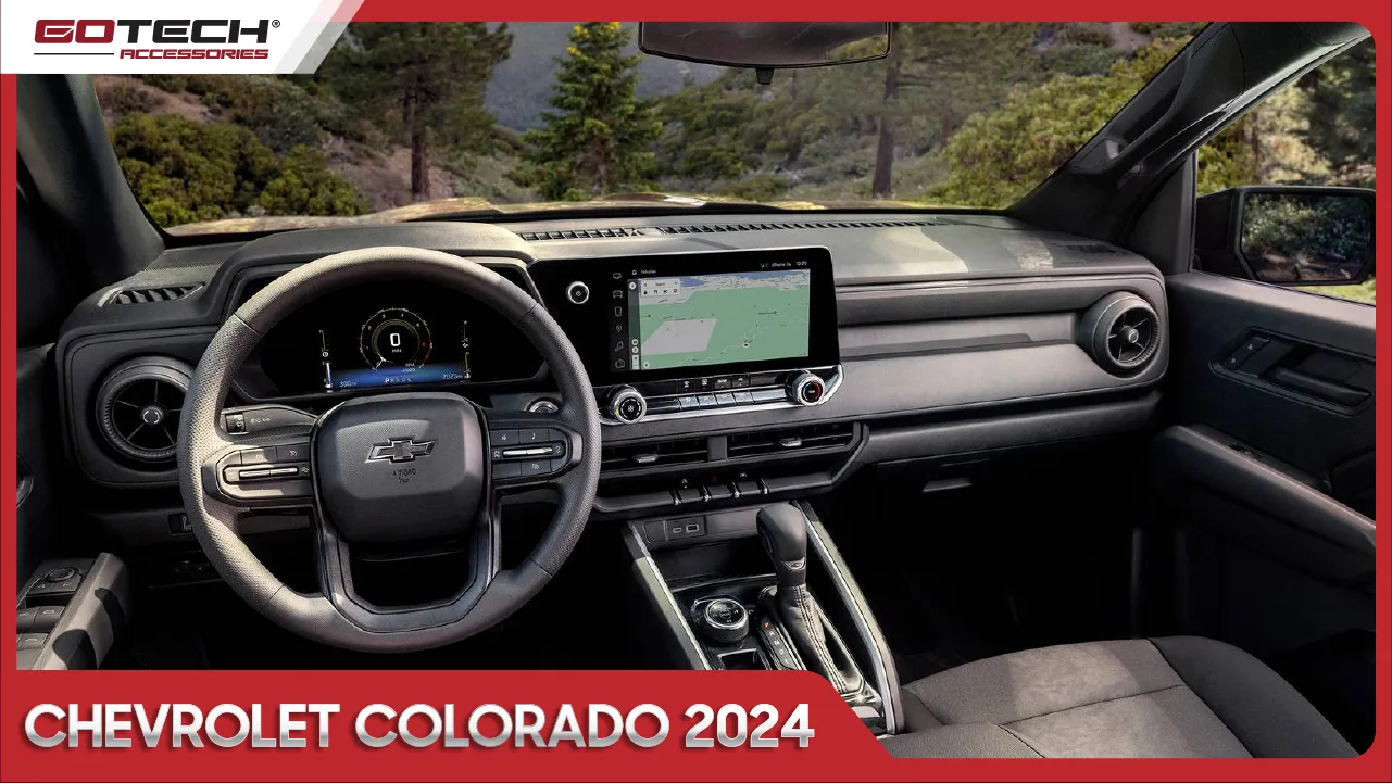 Khoang lái hiện đại của xe bán tải Colorado 2024 với vô lăng bọc da 3 chấu và cụm đồng hồ kỹ thuật số