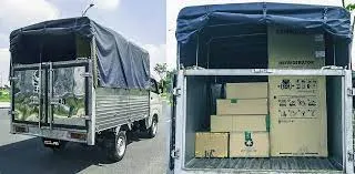 Xe tải TMT 1 tấn đang bốc dỡ hàng hóa tại bến cảng Cần Thơ.