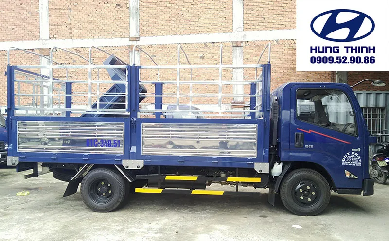 mặt bên xe tải iz65 đô thành màu trắng